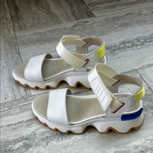 White Sandals with Yellow and Blue Accents